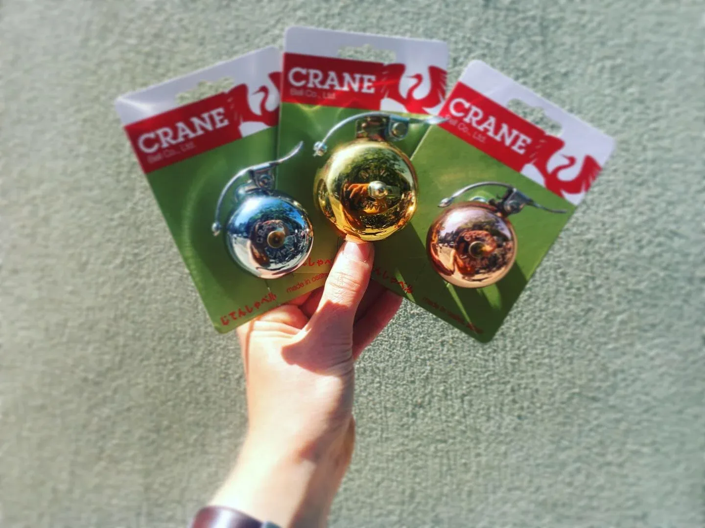 Crane brass bell